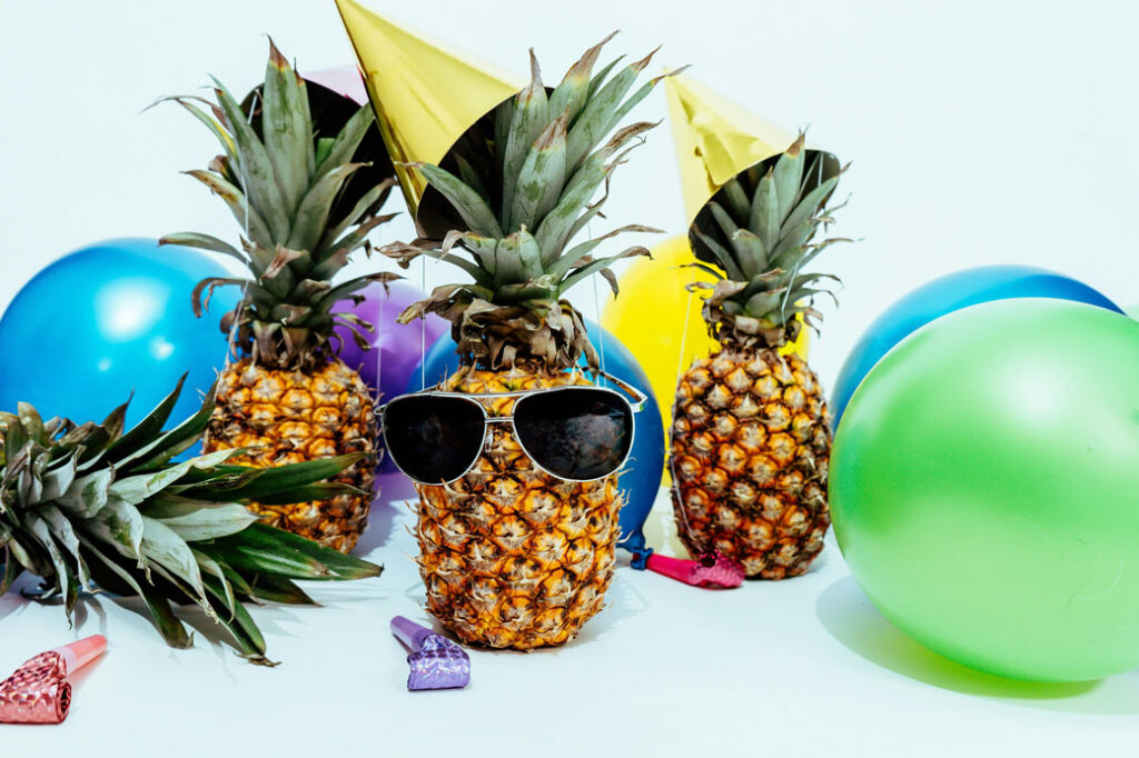 Photo by Pineapple Supply Co.: https://www.pexels.com/photo/photo-of-three-pineapples-surrounded-by-balloons-1071882/